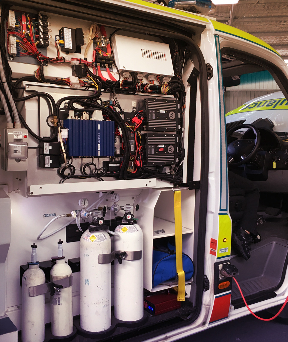 wiring comms panel on a Queensland Ambulance QAS duress camera system installed by Caintech Installation